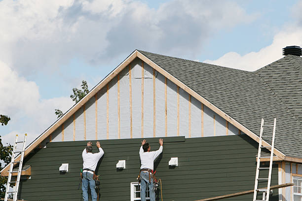 Professional Siding Replacement technician working in Alledonia, OH